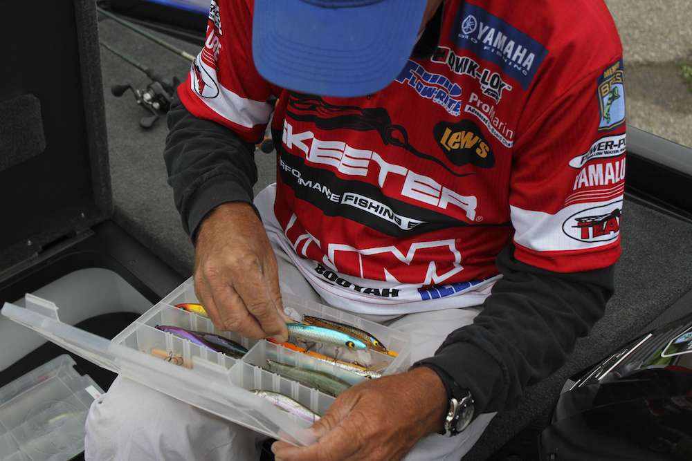 Rowland goes through his organized boxes to find his go to baits.