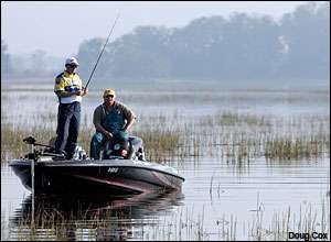 Mike McClelland fishes through mats of vegetation during practice for the CITGO Bassmaster Classic.