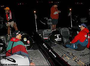 George Cochran and Jay Yelas wait in the pre-dawn darkness for the start of the CITGO Bassmaster Classic.