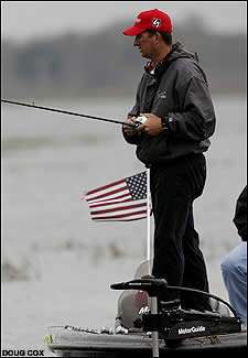 Old glory waves next to Jeff Reynolds as he plys the water for a big catch.