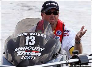 David Walker motions to the check-in official after the practice round on Lake Toho.