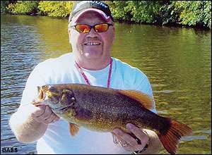 
	<strong>Brian L. Schultz</strong>
<p>
	6 pounds, 1 ounce<br />
	10/1/2005; 10:00 a.m.<br />
	Wisconsin River, Wis.<br />
	<b>Lure</b>: 4-inch Big Bites bait tube (smoky shad)<br />
	<b>Depth</b>: 8 feet, submerged tree limbs/brush</p>
