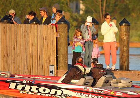 Family, friends, and interested spectators lined the launch dock.