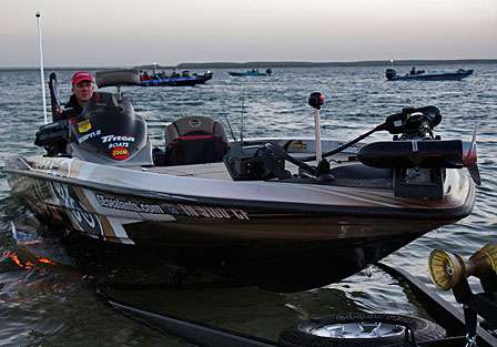 Brent Chapman loads his boat as other pros wait for their tow vehicles to arrive at the ramp.