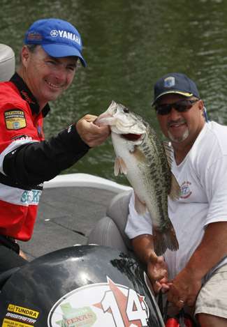 Mark Menendez holds up a good one. His co-angler is George Barefield.