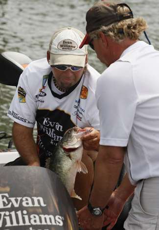 South Carolina's Jason Quinn bags his take with his co-angler Larry Triplett. Quinn redeemed himself after a horrible Day One (4-13) with 15-2 on Day Two, but he still finished in 74th place.