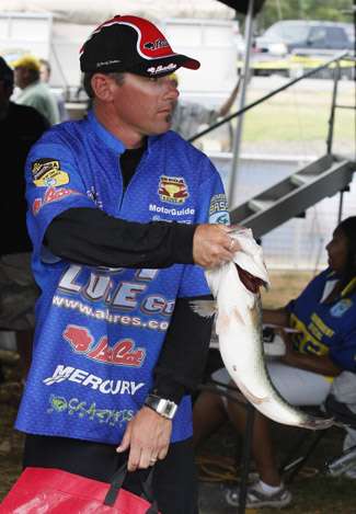Day One leader Grant Goldbeck shows off his 6-4 kicker fish.