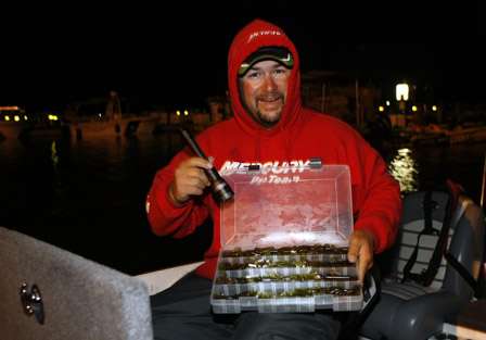 Fred Roumbanis shows off a box of his favorite bait.