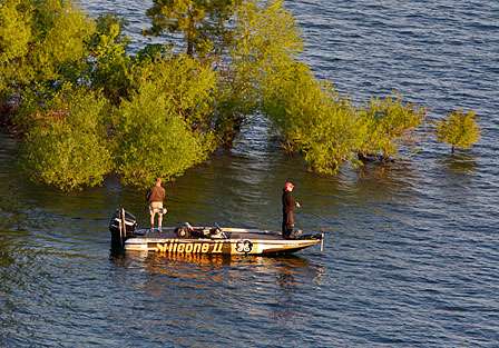 Brent Chapman fishes a small island covered with flooded willow trees.
