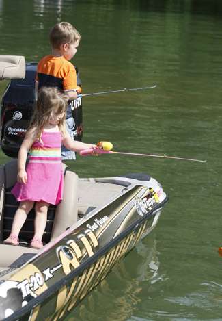 Brent Chapman's kids Mason, 4, and Makayla, 2, fish off their dad's boat.