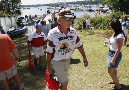 Rick Morris and co-angler Joe Kastner head for the weigh-in with a bag of fish.