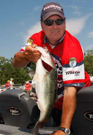 Davy Hite shows one while bagging his fish.