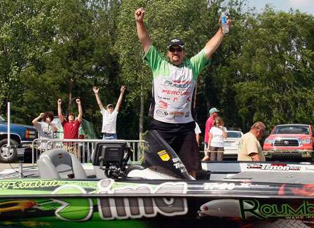 Fred Roumbanis is introduced as the final weigh-in angler.