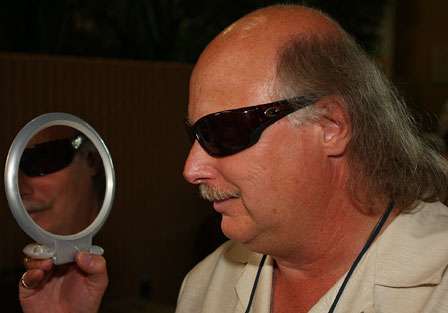 Don Barone tries on a pair of Costa Del Mar sunglasses, hoping they will help change his mojo.
