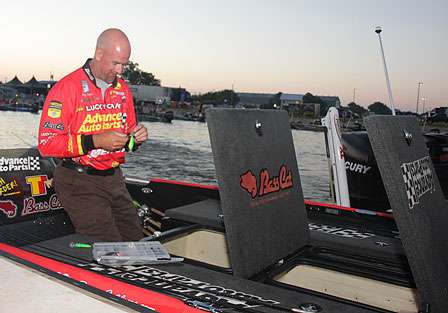 Marty Stone makes lure selections as the clock ticks closer to take-off time.
