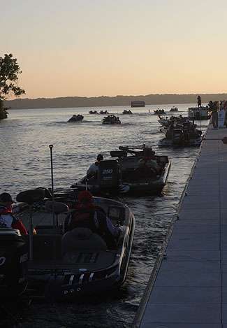 Boats slowly make their way out on to Wheeler Lake as the Southern Challenge gets under way.
