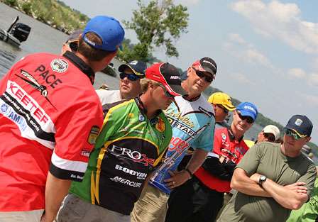 A large group of anglers and co-anglers wait to get their weigh in bags on Day One of the Southern Challenge on Wheeler Lake