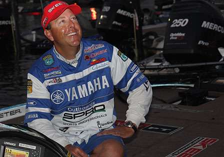 Dean Rojas talks with a fan on the dock. He is currently 51st, just one spot out of the cut going into Day Two and is fifth in the Toyota Tundra Bassmaster Angler of the Year point standings.