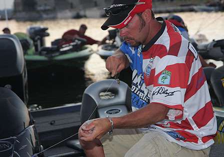 Glenn DeLong checks his line before getting in the line-up for launch on Day Two.