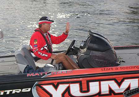 Matt Reed gives hand signals to his driver as he is dropped into Wheeler Lake. Reed enjoyed a great first day and sits in 11th place.