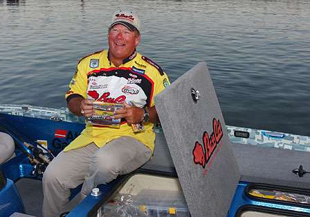 Elton Luce Jr. has a laugh with BASS officials as he readies for Day Two.