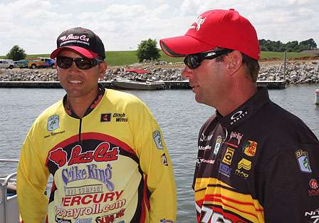 James Niggemeyer and Kevin VanDam talk about their day on the water as they wait in line for weigh-in bags.