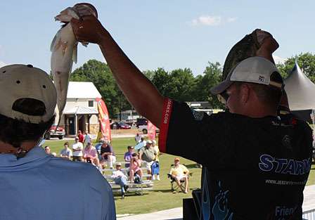 Jeremy Starks brings the crowd to life with this pair of Wheeler Lake bass. 