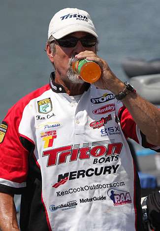 Ken Cook tries to rehydrate after a hot day on Wheeler Lake. Pro fishermen take a beating during the course of a season, especially from the heat.