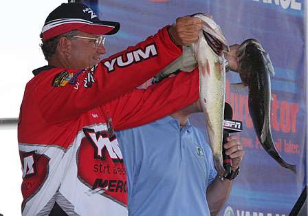 Matt Reed shows off a pair of nice Wheeler Lake bass that helped him to a seventh place finish for Day Two.