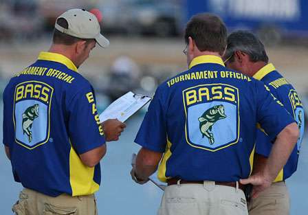 BASS officials look over the details of the morning launch just prior to line-up.