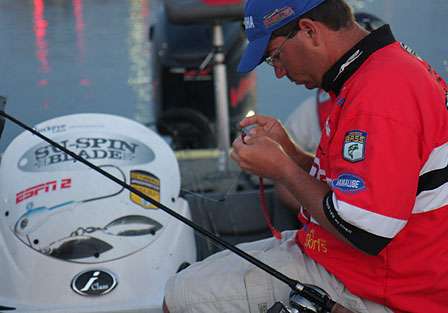 Cliff Pace threads a hook through a monster sized worm early on Day Three.