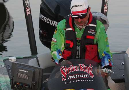 Shaw Grigsby decides which baits to leave out and which will go back in the box as ESPN cameras roll.