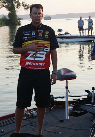 Kevin VanDam honors the flag just minutes before the launch of the final day on Wheeler Lake. Today a Southern Challenge champion will be revealed.