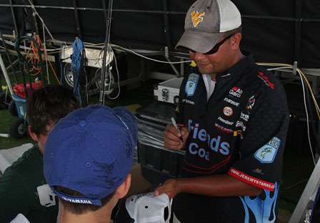 Jeremy Starks signs autographs backstage, just moments after winning the Southern Challenge.