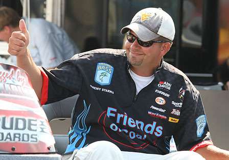 Jeremy Starks gives a thumbs-up to the crowd just moments before he would weigh in enough bass to win the Southern Challenge. 