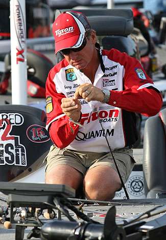 BASS veteran Gary Klein makes some last-minute tackle changes before beginning Day One of the Bluegrass Brawl.