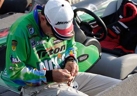 Shaw Grigsby makes adjustments to a bait as he prepares to do battle with the best bass anglers in the world.