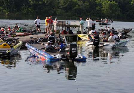 Pros pick up their co-anglers on the dock just prior to take-off on Day One of the Bluegrass Brawl presented by DieHard Platinum Marine Batteries.