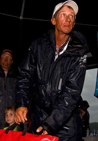 A soaked Kevin Wirth waits backstage to weigh-in. He would have 15 pounds even on the day good for 22nd place, and will fish for one of twelve places on Day Three.
