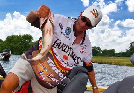 Kevin Wirth pulls one of his best fish from the livewell.