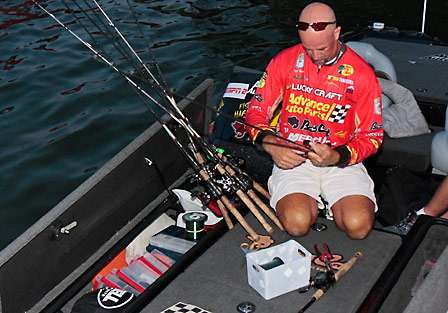 Marty Stone prepares gear early on Day Three. Stone starts the day in seventh place.