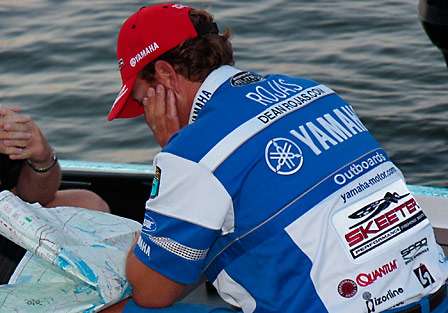 Dean Rojas studies a map of Old Hickory Lake as he puts together a day three strategy. Rojas starts the day in 16th, just four places out of today's weigh-in cut to the top-12.
