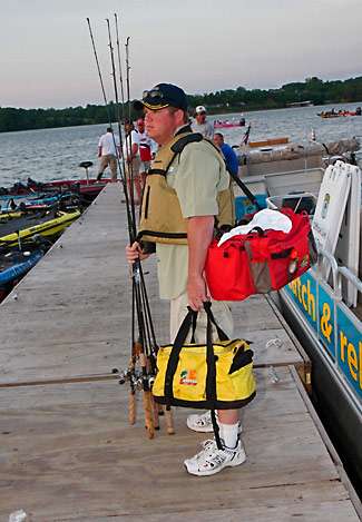 Co-angler Bryan Swanson waits on the dock for Steven Browning, his Day Three pro draw in the Tennessee Triumph.