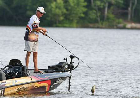 Tournament leader Kevin Wirth fights another fish to the boat.