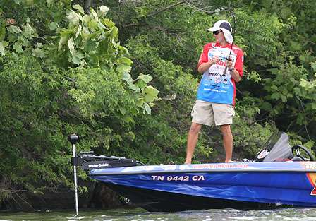 Randy Howell was fishing shallow and hooks up on a fish near a riprap wall.