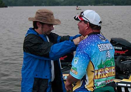 Ray Sedgwick gets wired up as time to launch nears. Sedgwick put up his biggest bag of the tournament at yesterday's weigh in, nearly doubling the weight of his first or second day bags. He leaves the dock in eighth place.