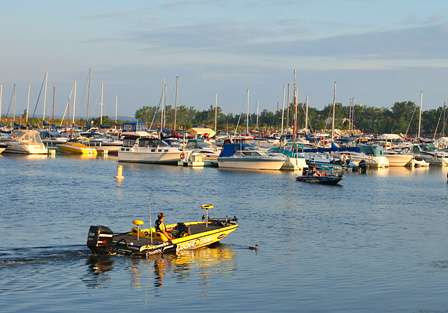 Skeet Reese idles into a quiet NFTA Boat Harbor before launch time on Day One of the Empire Chase. Reese is currently in fourth place in the Toyota Tundra Bassmaster Angler of the Year point standings. 