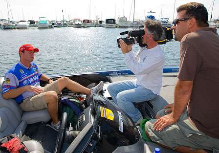 Mark Zona pulls Todd Faircloth aside to ask questions about the techniques he is using on Lake Erie for the upcoming Bassmaster television show that can be seen on ESPN2.