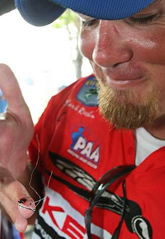 Clark Rheem had a mishap with a dropshot hook while fishing on Day Two. His co-angler tried to remove the hook with the old fishing line trick, but failed. Rheem was forced to fish the rest of the day with the hook embedded in his finger. 