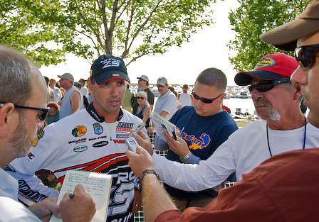 Industry media surround Edwin Evers after he weighed in 21 pounds, 11 ounces on Day Two. With his victory in 2007, Evers is going for back-to-back wins on Lake Erie. 